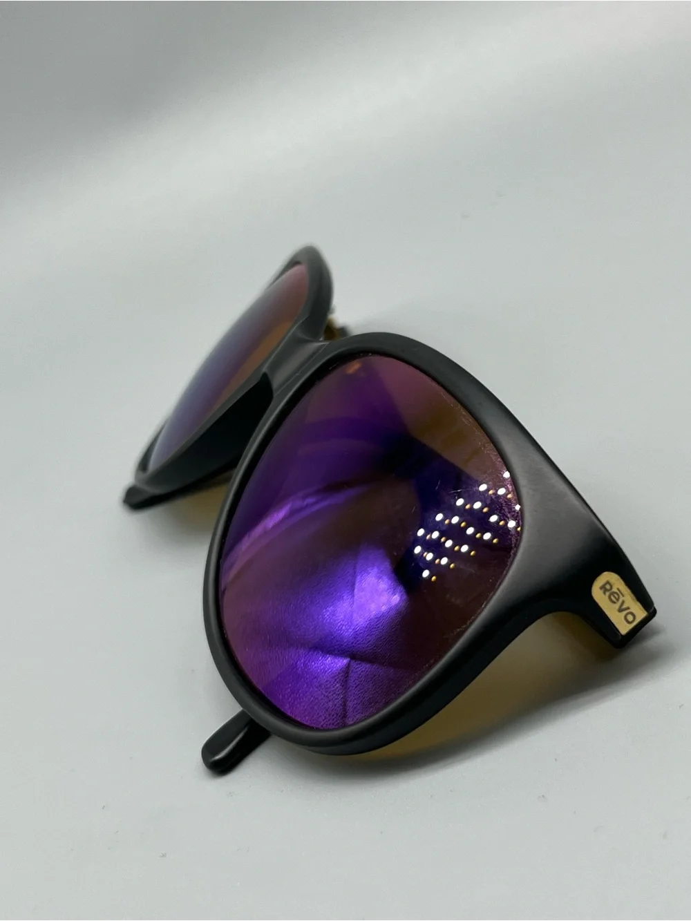 Revo Matte Black Sunglasses with Purple Mirrored Lenses